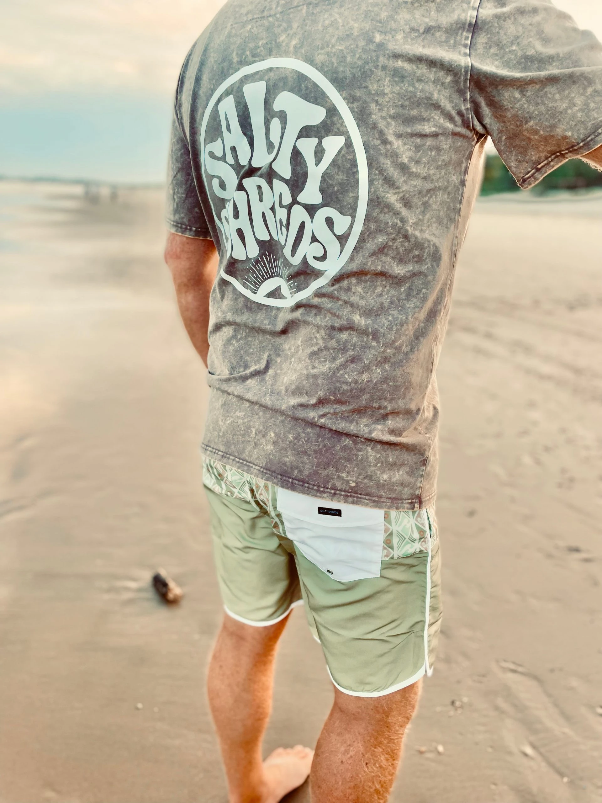 SS logo acid wash tee - mens Salty Shreds SS Logo Acid Wash Tee - Mens -Salty Shreds Shop image 147d7488 cae3 4dd0 84f0 e3c76d7a7801 1 scaled